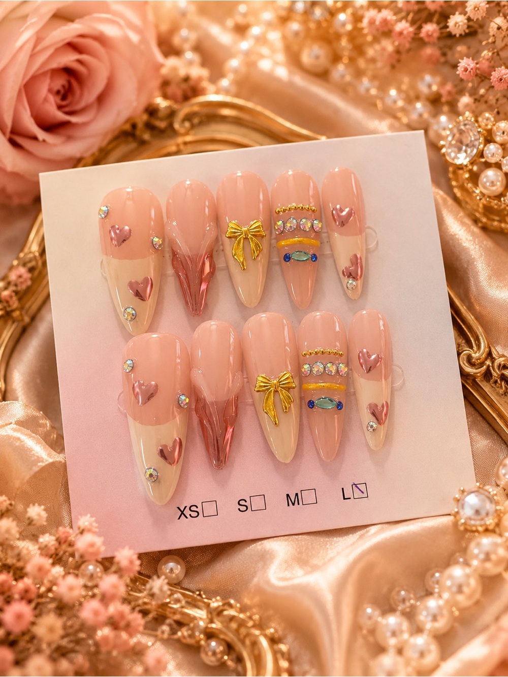 Pink Nude Stiletto Press-On Nails with Gold Bows & Heart Accents